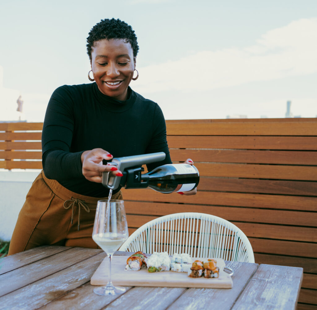 desiree using a coravin - gift for wine lovers