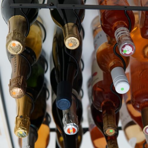 colored stickers in wine caps for organization and easy identification